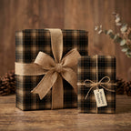 Rustic Christmas gift wrap on boxes with burlap ribbon and plaid wrapping paper.