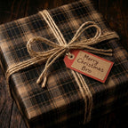 Rustic Christmas gift wrap with brown plaid paper, twine bow, and "Merry Christmas Bro" tag.