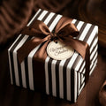 Luxury striped wrapping paper with a brown satin ribbon bow by Wrapped Studios.