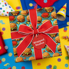 Fun birthday wrapping paper with a cartoon burger pattern and bright red ribbon.