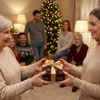 Elegant Christmas wrapping paper with gold bow by Wrapped Studios, held during family gift exchange.