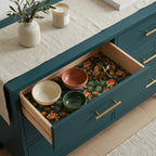 Green and orange cactus floral wrapping paper used as a luxury drawer liner by Wrapped Studios.