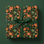 Luxury cactus floral wrapping paper with dark green ribbon on gift box by Wrapped Studios.