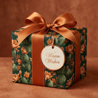 Desert cactus wrapping paper with a copper satin bow and Warm Wishes tag by Wrapped Studios.