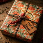 Spicy crawfish foodie wrapping paper with rustic twine and dried chili pepper by Wrapped Studios.