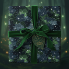 Elegant gift wrapped in dark floral wrapping paper with green velvet ribbon and leaf-shaped tag.