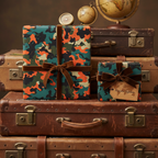 Gifts wrapped in modern camouflage wrapping paper with velvet ribbon, ideal for travel-themed celebrations.