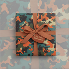 Gift wrapped in camouflage wrapping paper with a tan ribbon and a tag that reads "To My Fellow Adventuteer."