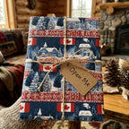 Rustic Canadian winter gift wrap with cabin pattern and twine bow by Wrapped Studios.