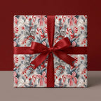 Vintage Christmas wrapping paper with candy canes and pinecones, tied with a red ribbon by Wrapped Studios.