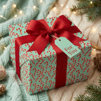 Candy cane Christmas wrapping paper in mint green with a red bow on a cozy holiday gift box by Wrapped Studios.