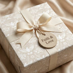 Elegant dove baptism gift wrap with cream ribbon and Faith & Love tag by Wrapped Studios.