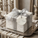 Elegant First Communion wrapping paper with dove pattern and silver ribbon by Wrapped Studios.