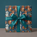 Puppy dog Christmas gift wrap with a festive pine pattern and a teal satin ribbon by Wrapped Studios.