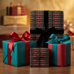 Black congratulations wrapping paper on luxury gift boxes with bows by Wrapped Studios.