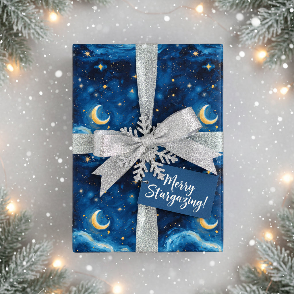Navy blue Christmas gift wrap with moon & star pattern, silver ribbon, and "Merry Stargazing" tag.