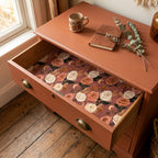 Vintage boho floral wrapping paper with cream roses lining a terracotta dresser drawer by Wrapped Studios.