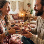 A couple exchanging a gift in rustic boho floral wrapping paper from Wrapped Studios.