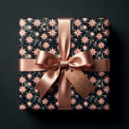 Luxury celestial star wrapping paper in rose gold and navy blue with satin ribbon by Wrapped Studios.