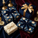 Luxury celestial wrapping paper with navy and gold sun and moon patterns by Wrapped Studios.