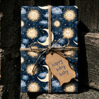 Celestial birthday wrapping paper with vintage sun and moon pattern by Wrapped Studios.