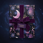 Luxury gift wrapped in celestial floral wrapping paper with a plum velvet ribbon and bow.