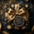 Luxury celestial wrapping paper with gold sun and moon patterns and a satin bow, by Wrapped Studios.