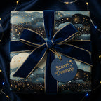 Navy blue starry wrapping paper with gold details and velvet ribbon from Wrapped Studios.