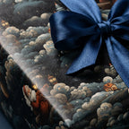 Vintage Santa Claus Christmas wrapping paper with a luxury navy blue satin bow by Wrapped Studios.