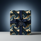 Navy ribbon on luxury gift box with gold swirl pattern wrapping paper.