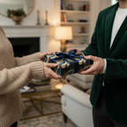Gift exchange with navy celestial wrapping paper and ribbon.