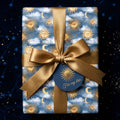 Luxury celestial wrapping paper with gold sun and moon pattern and satin ribbon bow by Wrapped Studios.