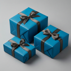 Three blue gifts wrapped with grey satin ribbon, perfect for birthdays or celebrations.
