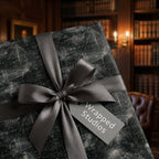 Chalkboard math equations wrapping paper with a dark grey satin ribbon and gift tag by Wrapped Studios.