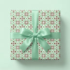 Elegant mint green and brown vintage tile wrapping paper with a satin bow by Wrapped Studios.