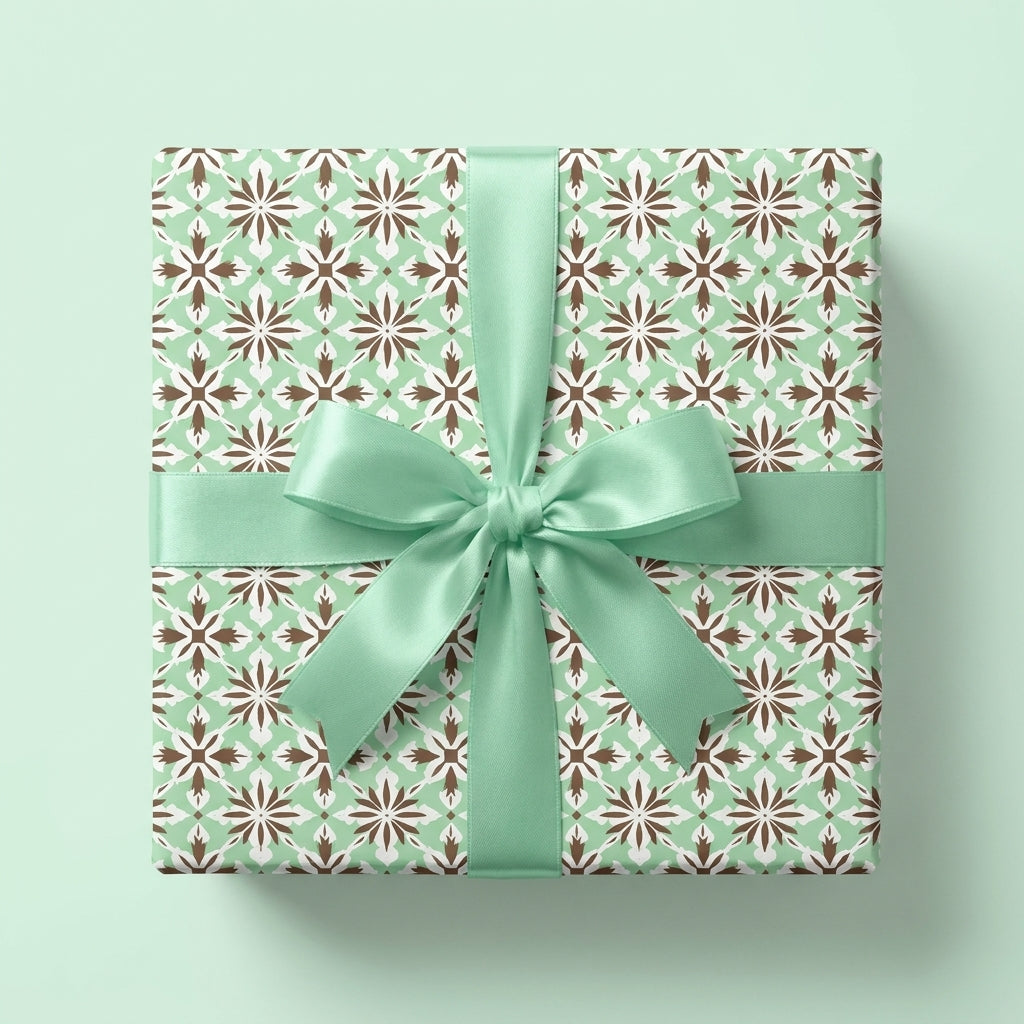 Elegant mint green and brown vintage tile wrapping paper with a satin bow by Wrapped Studios.