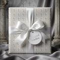 White cross religious wrapping paper with satin bow for baptism or first communion by Wrapped Studios.