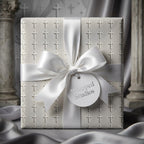 White cross religious wrapping paper with satin bow for baptism or first communion by Wrapped Studios.