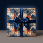 Christmas gift wrap featuring a snowy London cityscape pattern and navy ribbon.