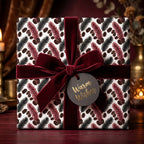 Luxury Christmas wrapping paper with botanical print and burgundy velvet ribbon by Wrapped Studios.