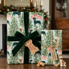 Dog Christmas wrapping paper featuring evergreen trees and green velvet bow by Wrapped Studios.