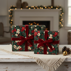 Two Christmas gifts wrapped in dark green floral wrapping paper with red velvet ribbons.