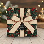 Square gift wrapped in elegant floral Christmas wrapping paper with a cream ribbon and bow.