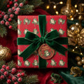 Frog Christmas wrapping paper with a luxury green velvet bow and holiday tag by Wrapped Studios.