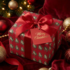 Whimsical frog Christmas wrapping paper with elegant red bow and tag by Wrapped Studios.