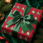 Funny frog Christmas wrapping paper with a green satin bow on a gift box by Wrapped Studios.