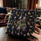 Elegant Christmas gift wrap with ornate ornament pattern and gold ribbon.