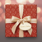 Red Christmas gift wrap with a minimalist snowflake pattern, cream ribbon, and "Winter's Embrace" gift tag.