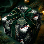 Luxury snowman Christmas wrapping paper with a green velvet bow by Wrapped Studios.