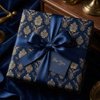 Elegant navy floral wrapping paper with a blue satin bow and "For You" tag.